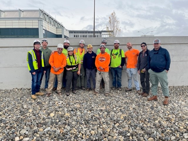 Group of construction workers on roof 