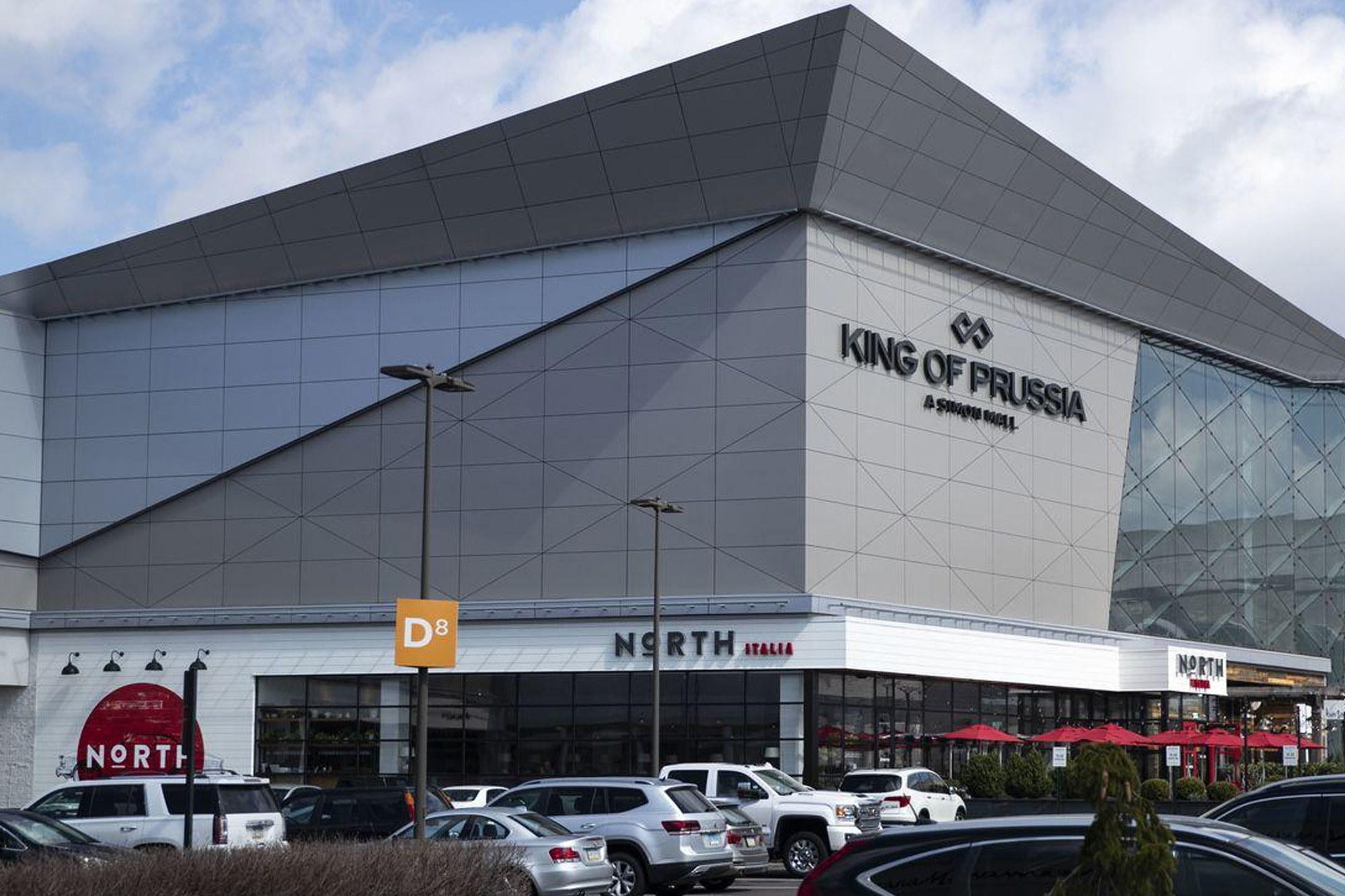 image of front of King of Prussia Mall on corner (gray panel structure)